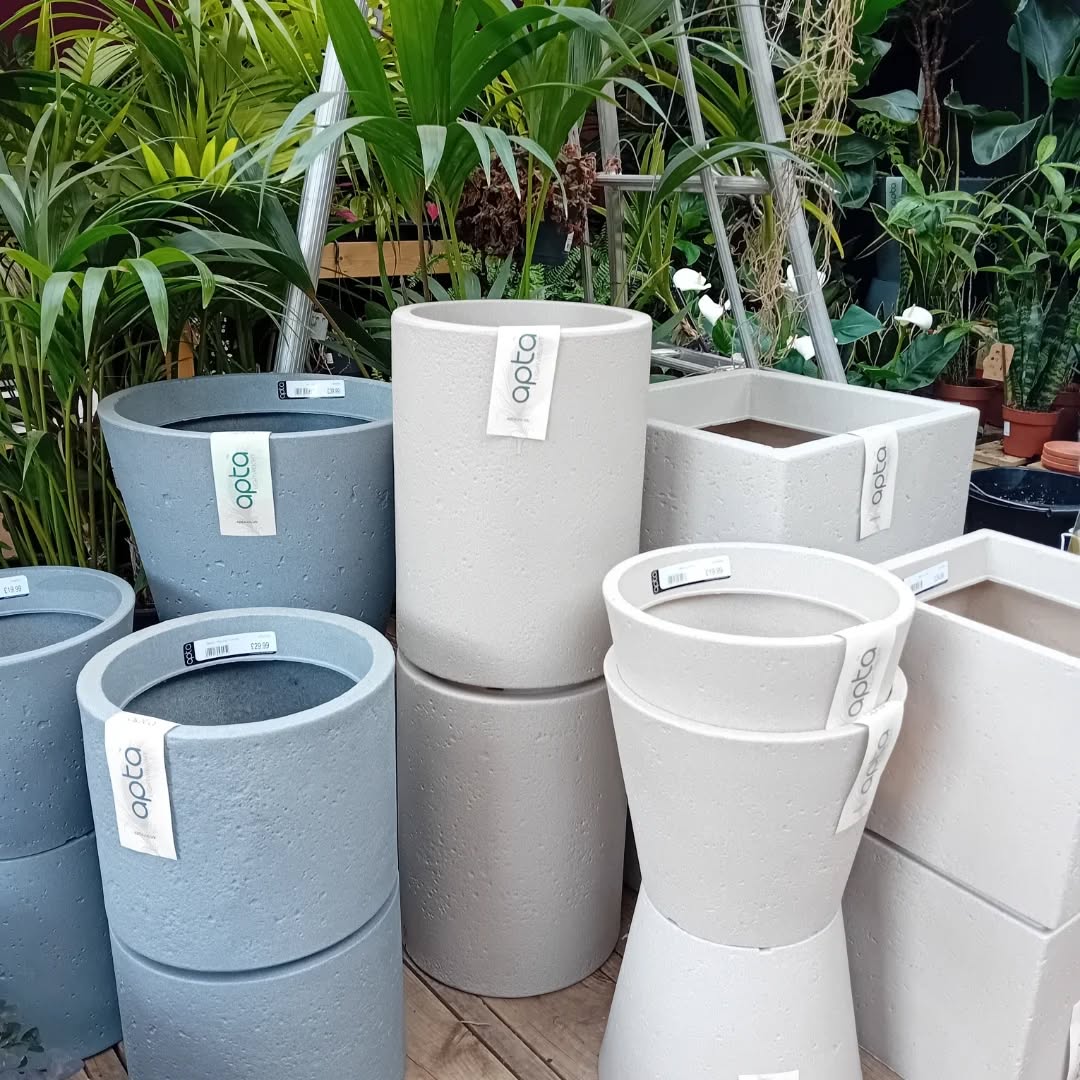 A selection of grey, blue and white Apta pots